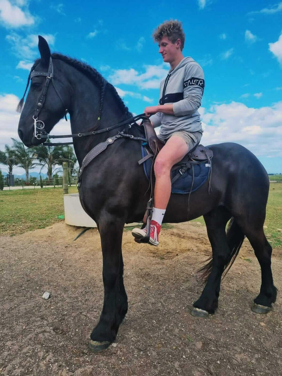 Jano on a black horse